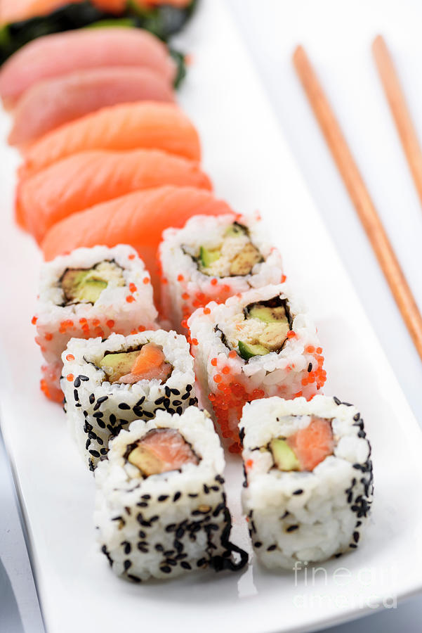 Sushi Rolls On Ceramic Plate Closeup Photograph
