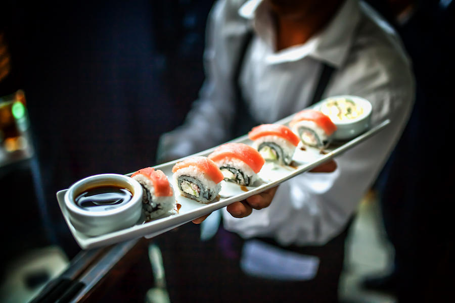 Sushi server in a restaurant Photograph by ©fitopardo