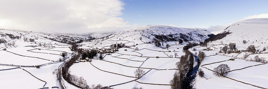 Swaledale Muker and thwaite covered in snow in winter aerial North Yorkshire Dales England Photograph by Sonny Ryse