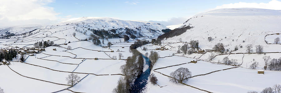 Swaledale river covered in snow in winter aerial North Yorkshire Dales Photograph by Sonny Ryse