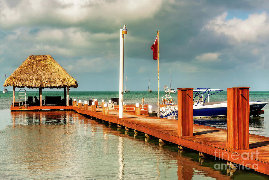 Swimming deck of the shore in the island of Caye Caulker, Belize Photograph by Marek Poplawski
