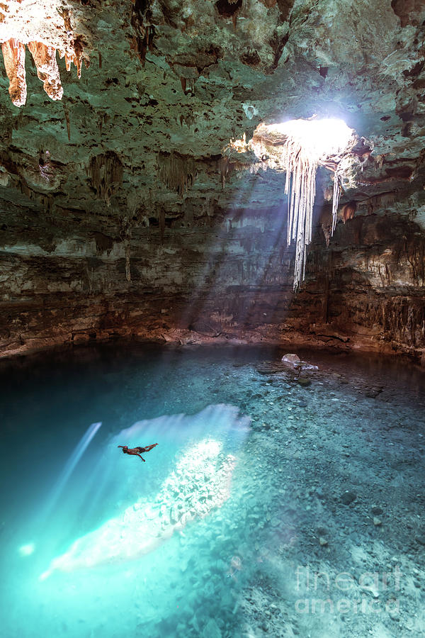 Swimming in the Blue Cenote Photograph by Matteo Colombo