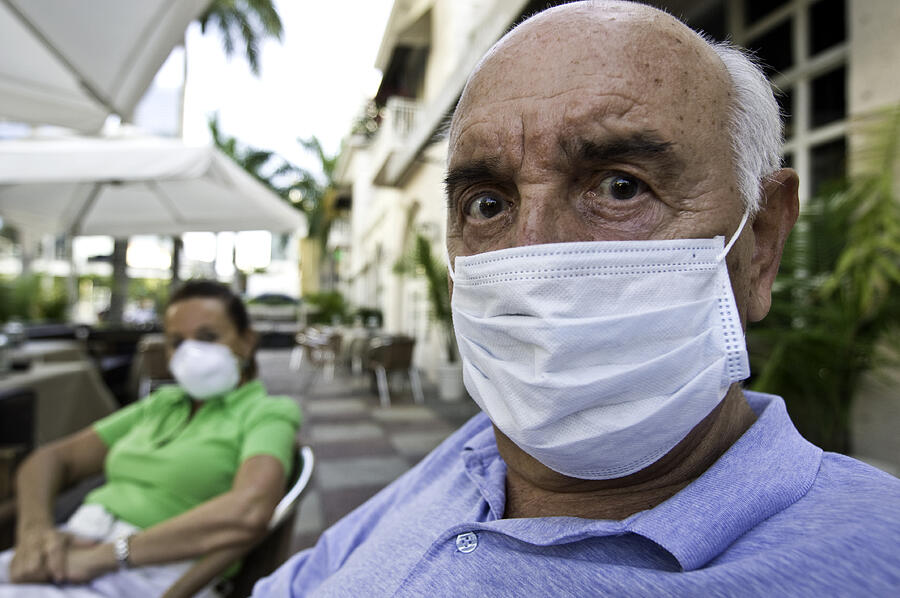 Swine flu paranoia Photograph by Juanmonino