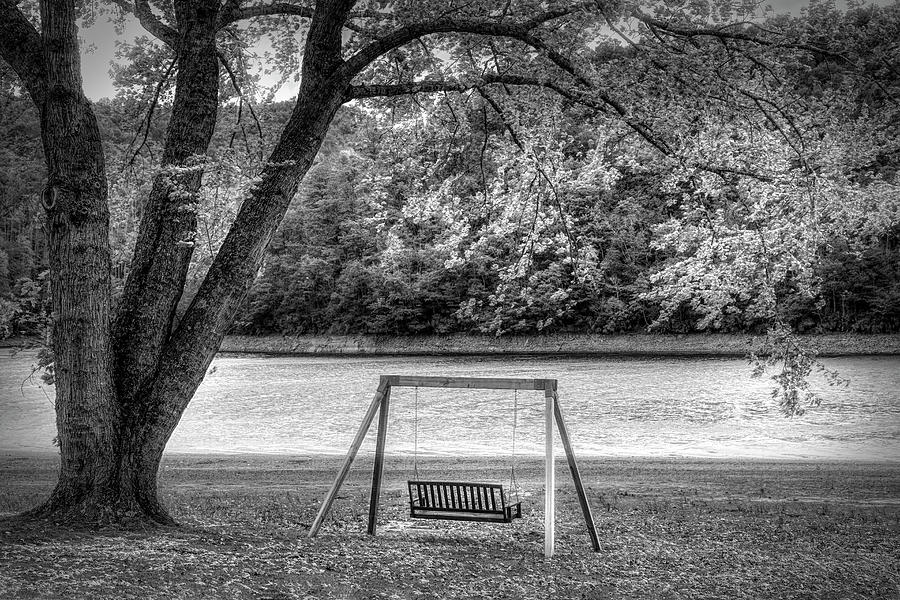 Swing at the River Black and White Photograph by Debra and Dave Vanderlaan