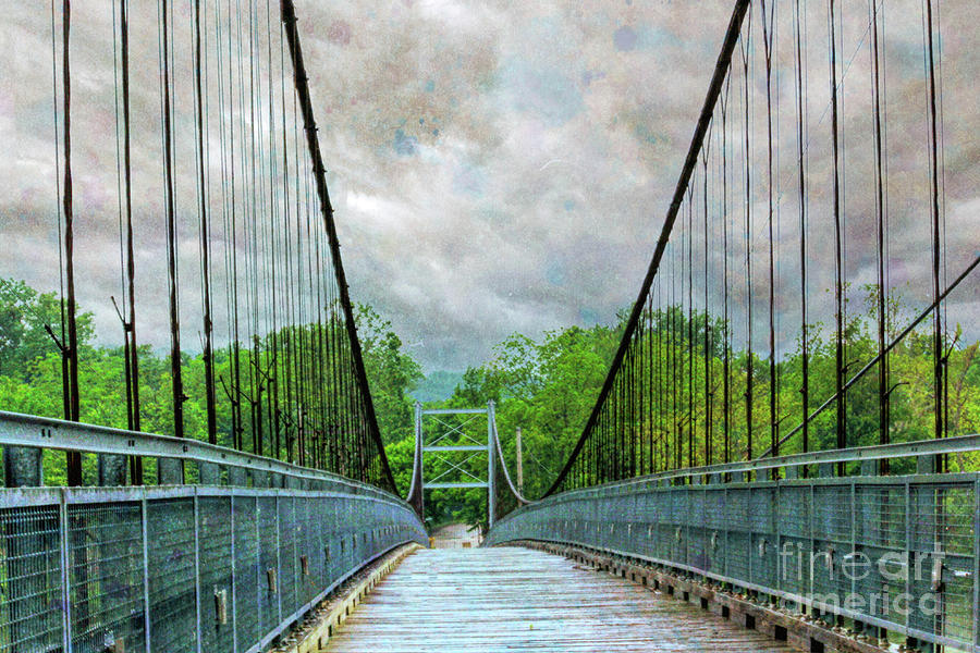 Swinging bridge Photograph by Lynn Sprowl