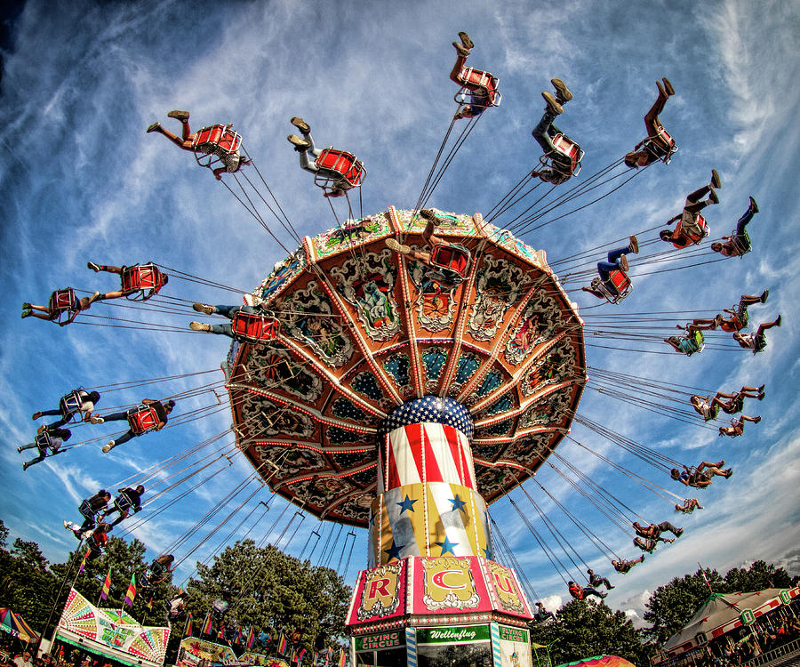 Swinging Ride Photograph by Mark Chandler - Pixels