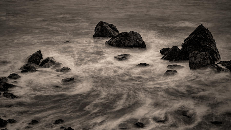 Swirling waters, long exposure by the sea Photograph by Alessandra RC