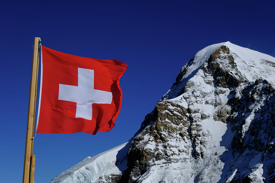 Swiss flag with Eiger Photograph by Chevy Fleet