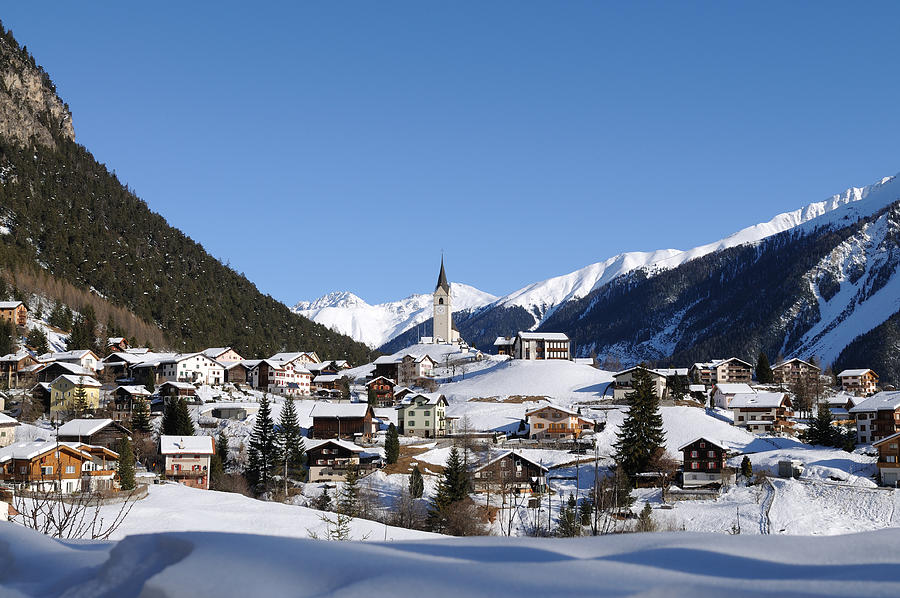 Swiss Village in Winter near Davos Photograph by Rolphus