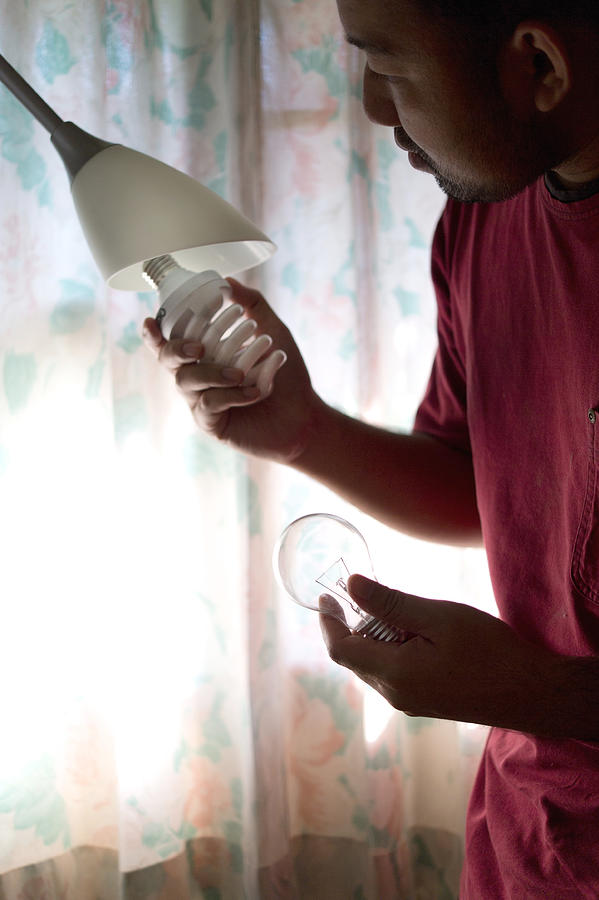 Switching To Energy-efficient Lightbulbs #4 Photograph by Krit of Studio OMG
