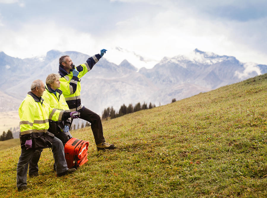 Switzerland Mountain Rescue Team Signaling Photograph by NicolasMcComber