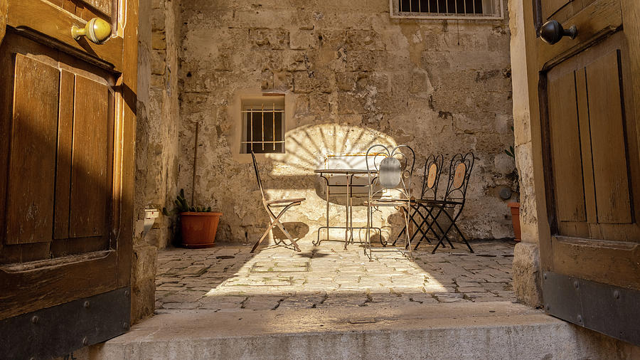 Table and Chairs in Matera Italy  Photograph by John McGraw