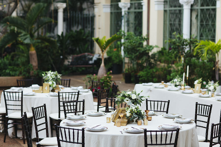Tables at a Courtyard Wedding Reception Photograph by AnnaGodfrey