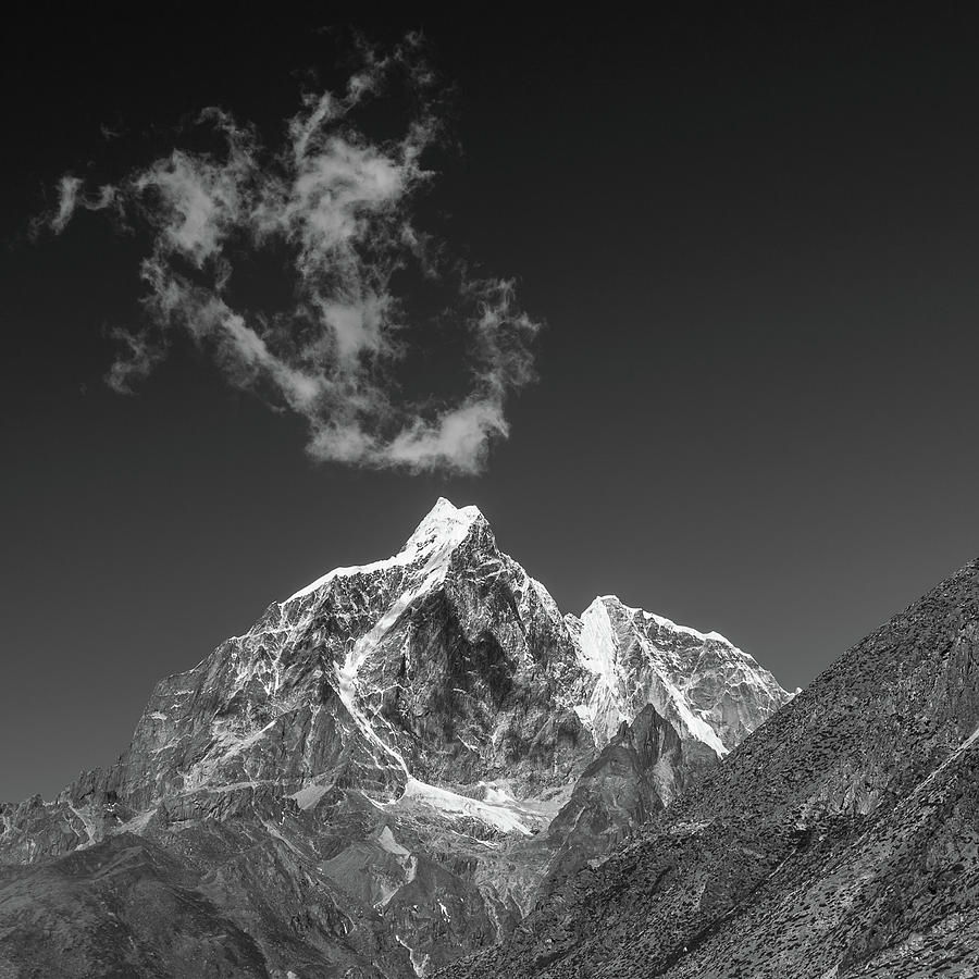 Taboche Peak and a cloud. A greyscale photograph. Photograph by Radek ...