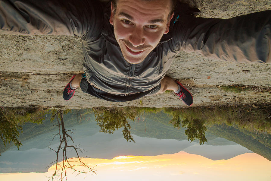 Taking a selfie up side down on the nature Photograph by Artur Debat