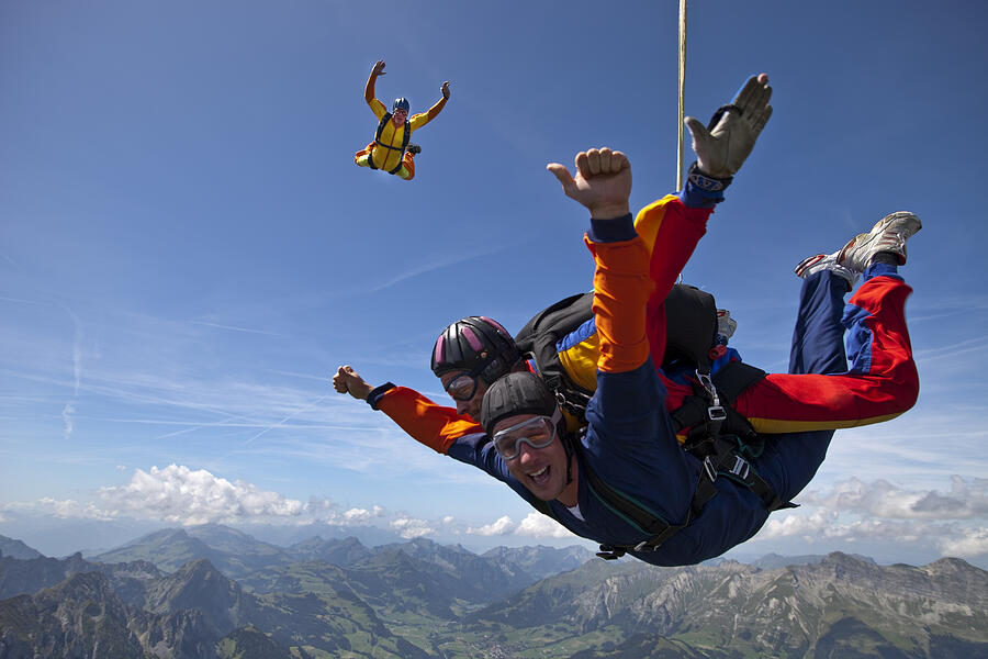 Tandem couple having fun in the sky together. Photograph by Oliver Furrer