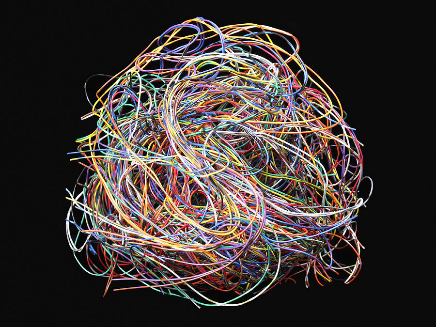 Tangled ball of colored wires against black Photograph by Steven Puetzer