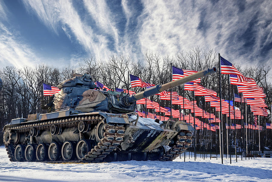 Tank and Flags on display at the Mcfarland Veterans Memorial at Edwards Foye American Legion Photograph by Peter Herman