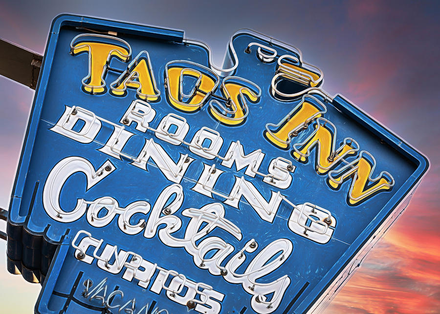 Taos Inn Thunderbird Sign Photograph by Stephen Stookey