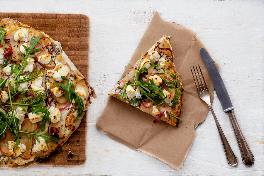 Tarte flambée with goat cheese and apple slides Photograph by Carolafink