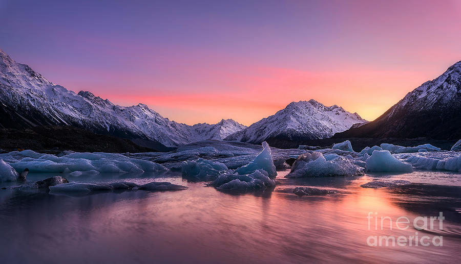 Tasman Lake in New Zealand at sunrise Photograph by Thomas Jones