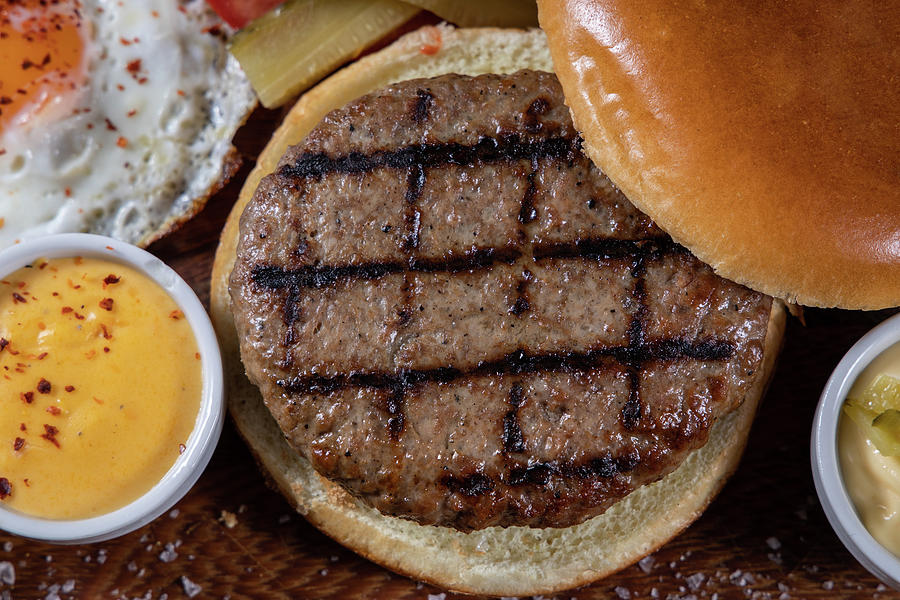 Tasty Grilled Burger With Ingredients. Delicious Burger Top Down View Photograph
