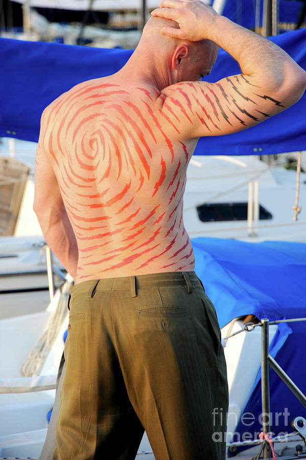 Tattooed back of muscular bald man Photograph by Gunther Allen