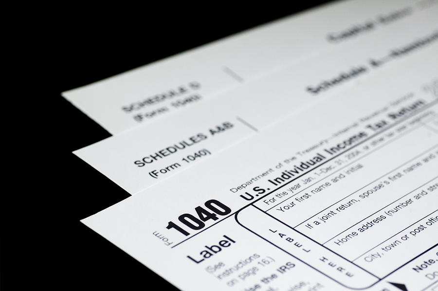 Tax Forms on Black Photograph by Leezsnow