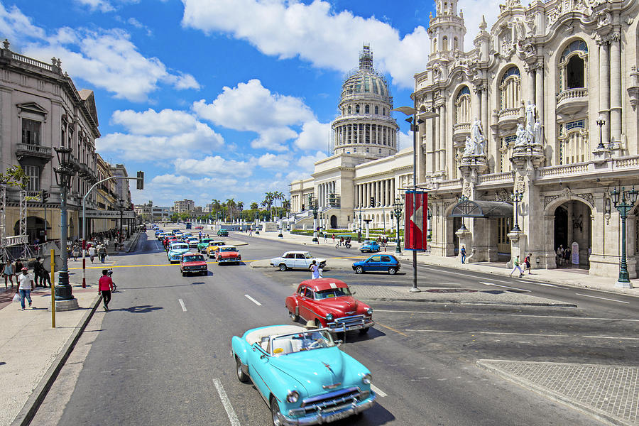 Taxis on street by Capitolio building in Havana Photograph by Xavierarnau