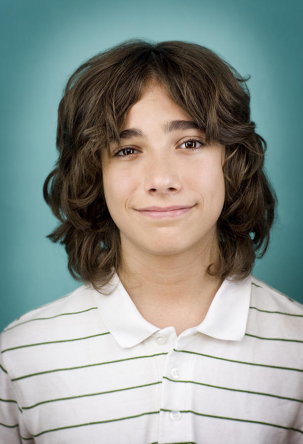 Teenage boy (14-15) smiling, portrait, close-up Photograph by David Sacks