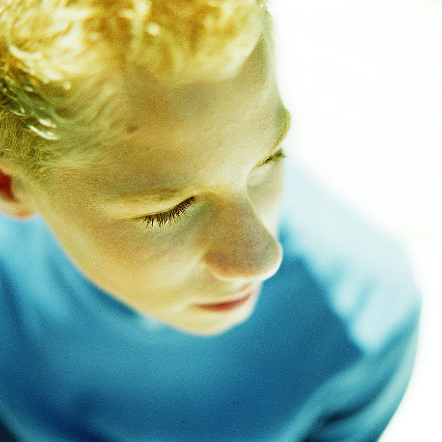 Teenage boys face, high angle view Photograph by Patrick Sheandell OCarroll
