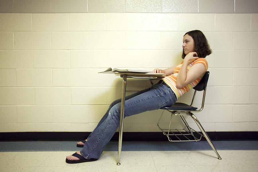 Teenage girl in school Photograph by Thinkstock