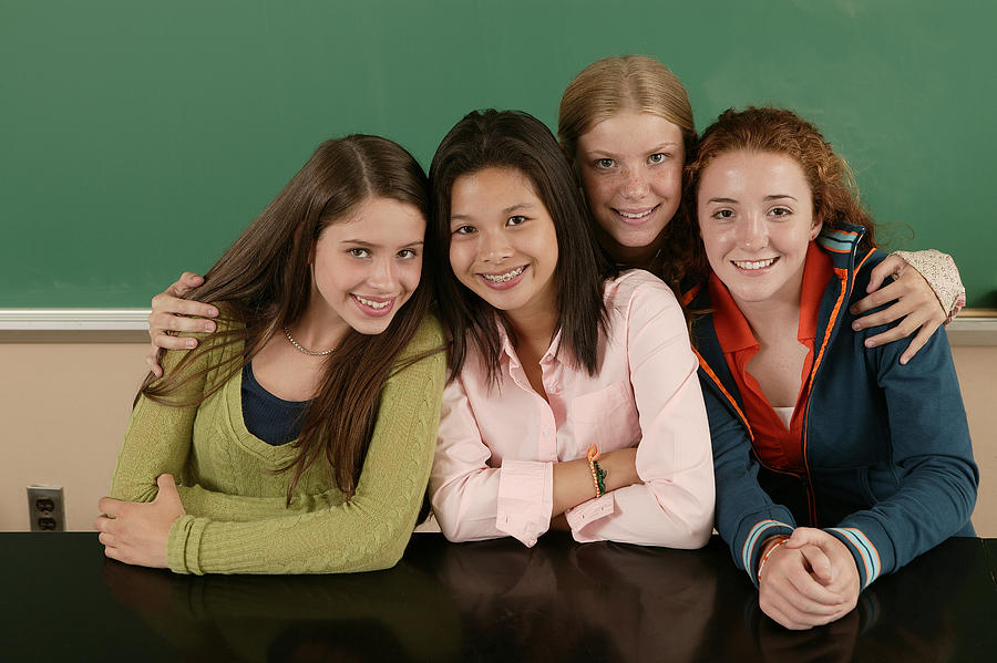 Teenage girls at school Photograph by Comstock Images