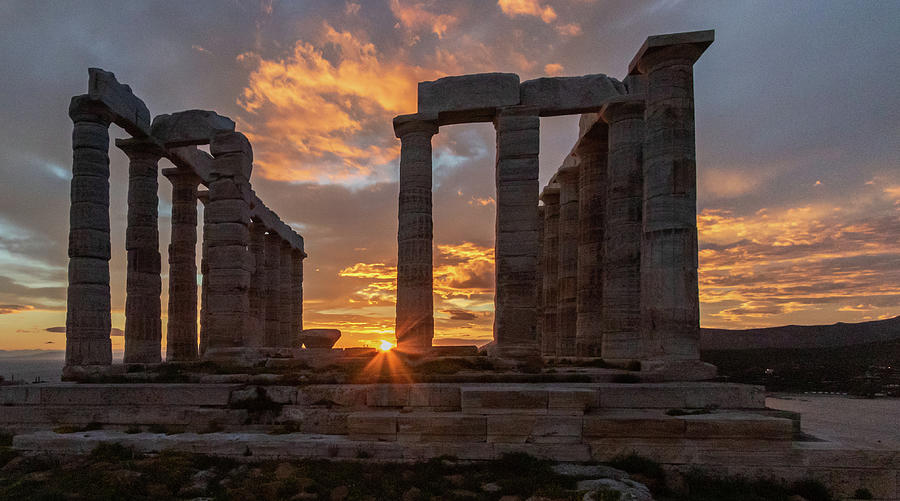 Temple of Poseidon with setting sun  Photograph by Dan Hartford