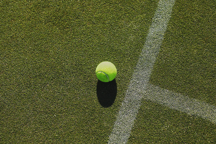 Tennis Ball And T Shape Mark With Chalk Lines Still Life Overhead View Photograph by Patrick Fraser