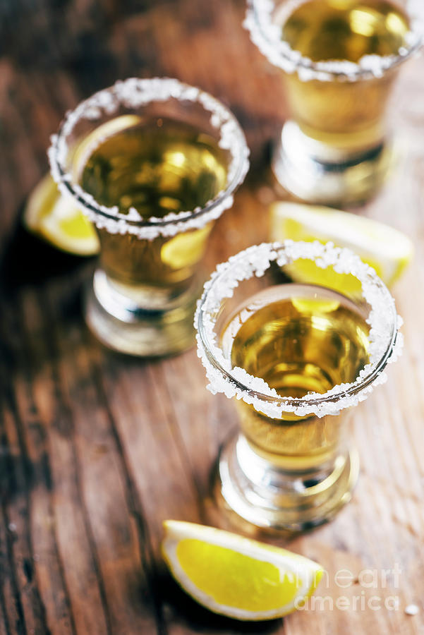 Tequila in shot glass with lime and salt  Photograph by Jelena Jovanovic