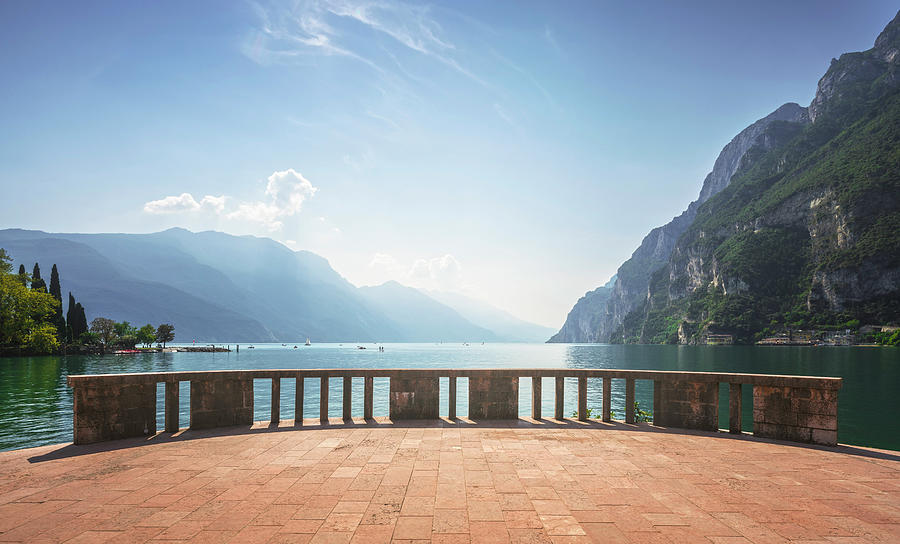 Terrace on the lake. Riva del Garda, Italy Photograph by Stefano Orazzini