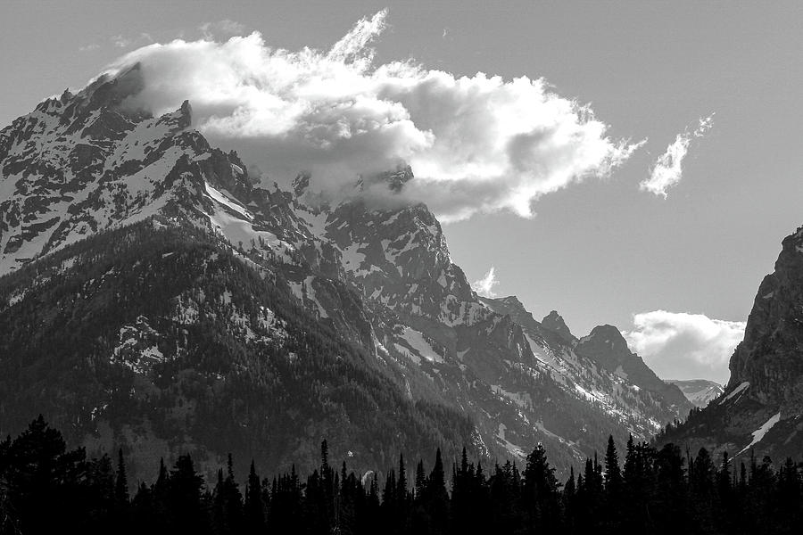 Tetons in the Clouds Photograph by Lynn Thomas Amber