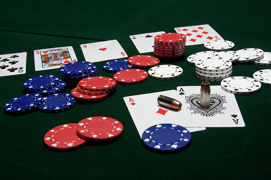 Texas Holdem Poker Pair of Bullets Photograph by Bob Decker