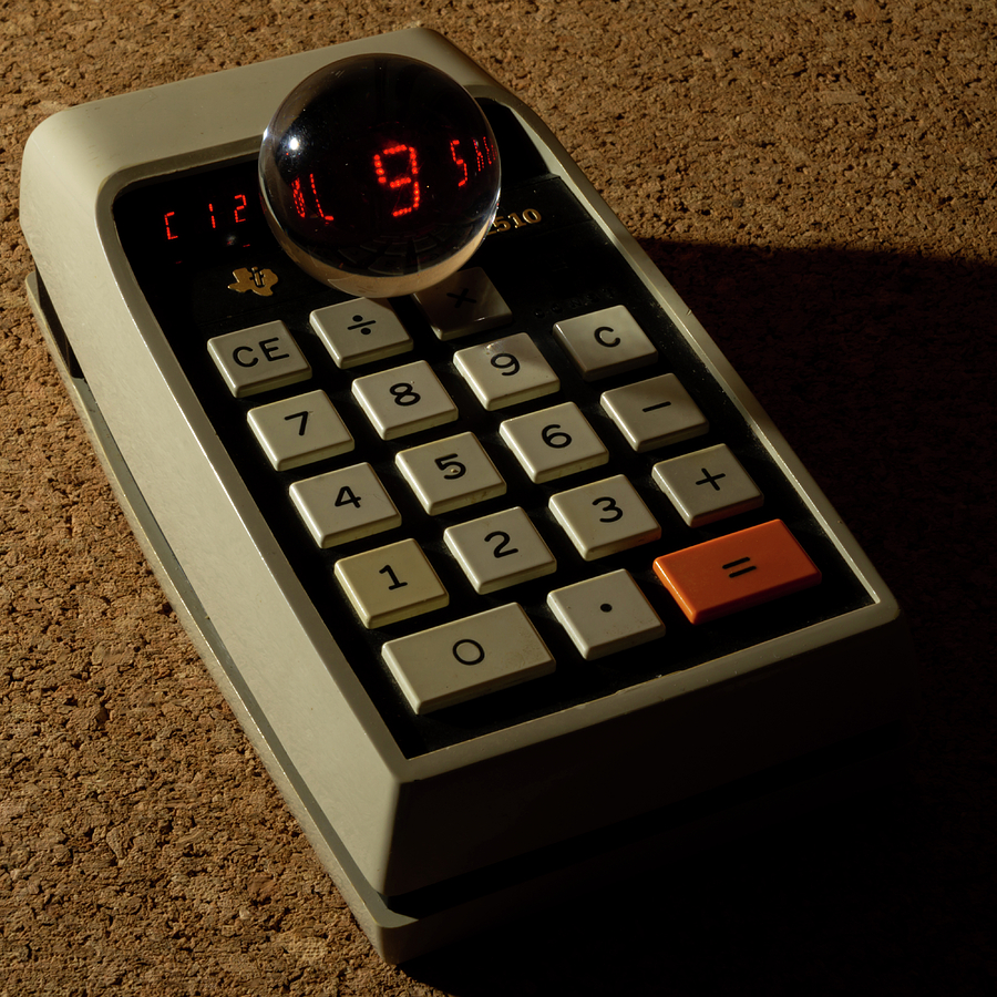 Texas Instruments Calculator Photograph by Rolf Bertram