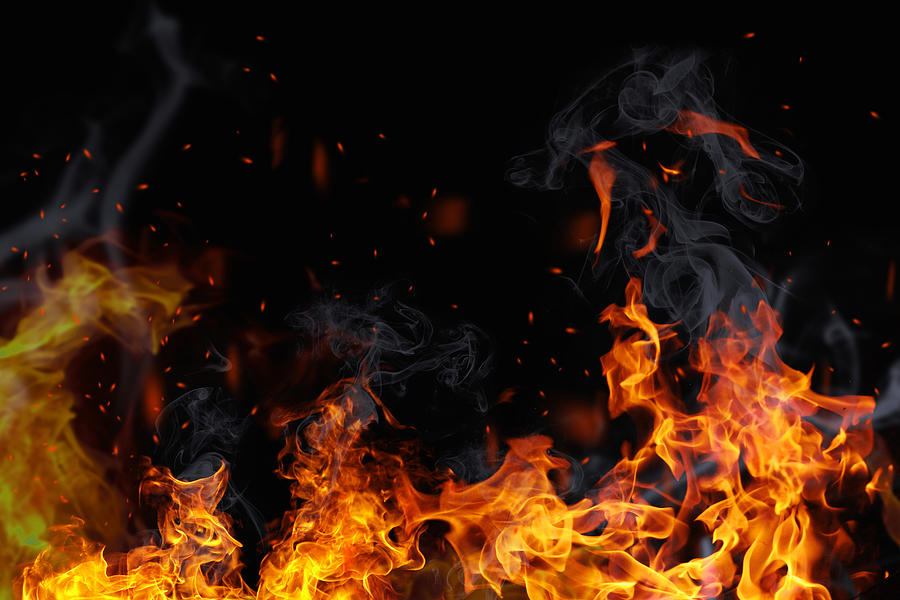 Texture of fire on a black background. Photograph by VeroRo39