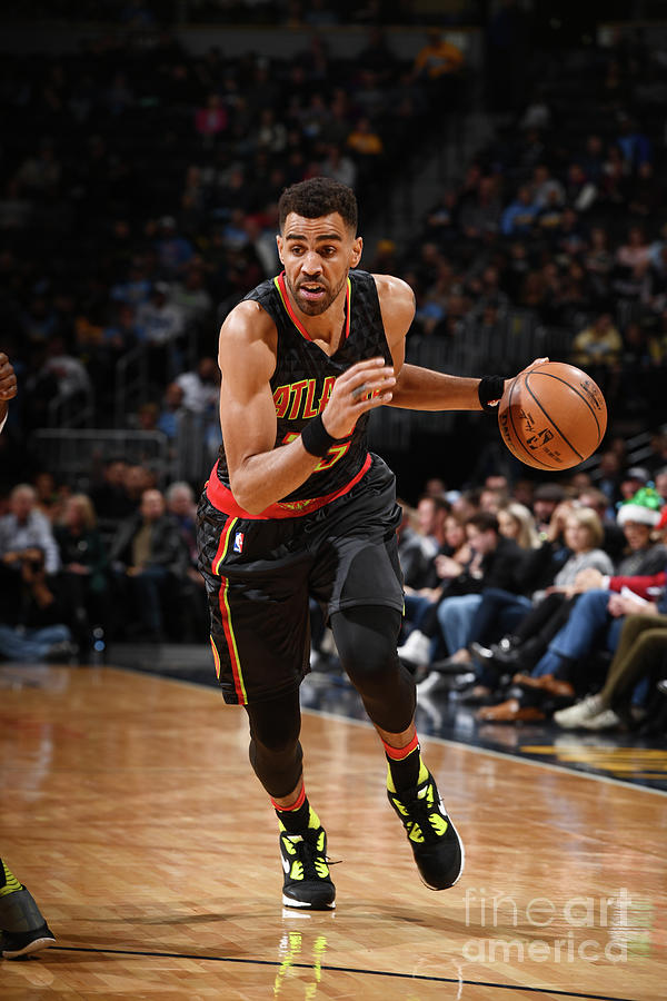 Thabo Sefolosha Photograph by Garrett Ellwood Thabo Sefolosha Photograph by Garrett Ellwood