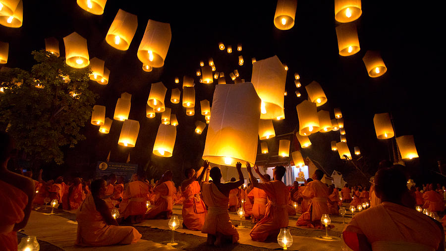 Thai Buddhist Monks float lanterns Photograph by Lifeispixels