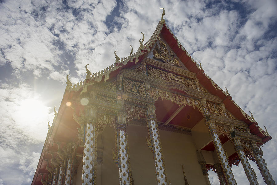 Thai Temple With Blue Sky And Clouds In Background Photograph by IttoIlmatar