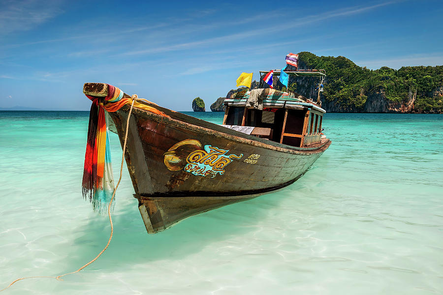 Thailand - long tail boat at Loh Dalum Bay on Koh Phi Phi Photograph by Olivier Parent