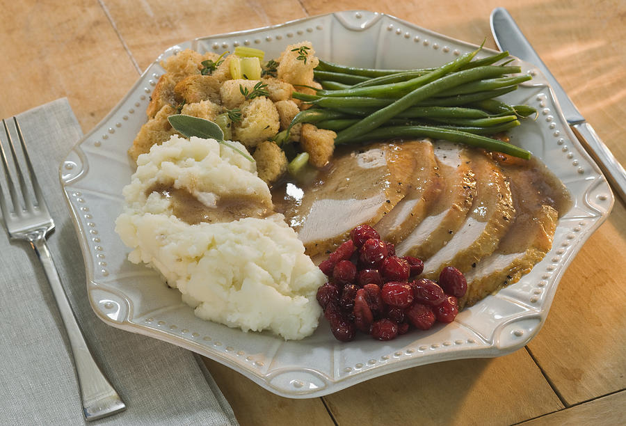 Thanksgiving dinner on plate Photograph by Tetra Images