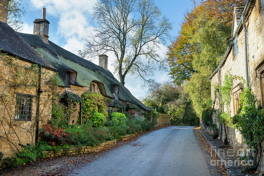 Thatched Cotswold Stone Cottage in Autumn Photograph by Tim Gainey
