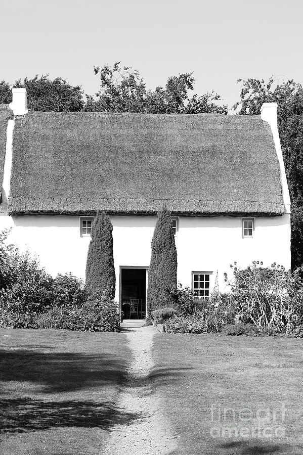 Thatched Roof House Vertical bw Photograph by Eddie Barron