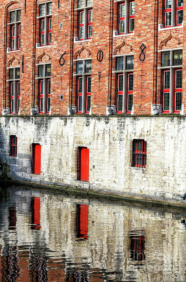 The 608 Building in Bruges Photograph by John Rizzuto