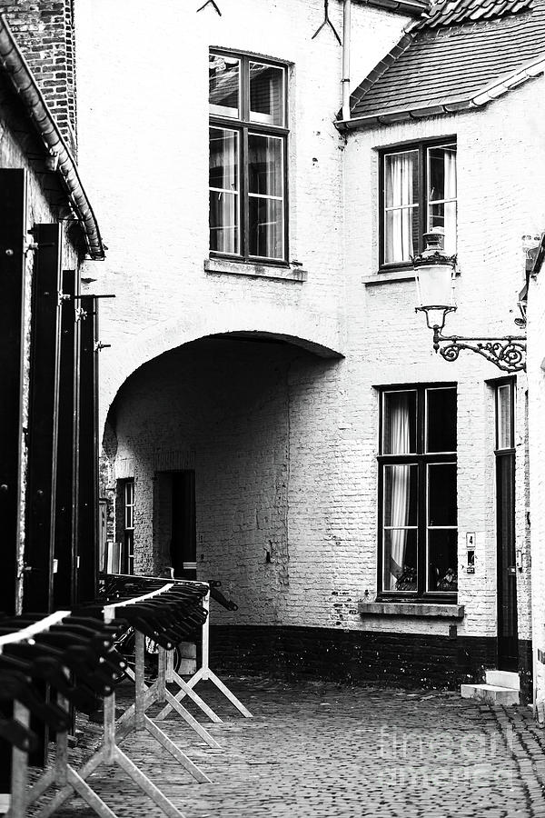 The Alley in Bruges Photograph by John Rizzuto